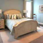 Thumbnail of http://a%20bed%20room%20with%20a%20neatly%20made%20bed%20and%20two%20nightstands