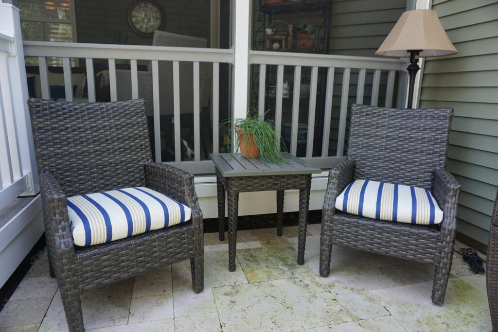 Thumbnail of http://two%20chairs%20and%20a%20table%20on%20a%20porch
