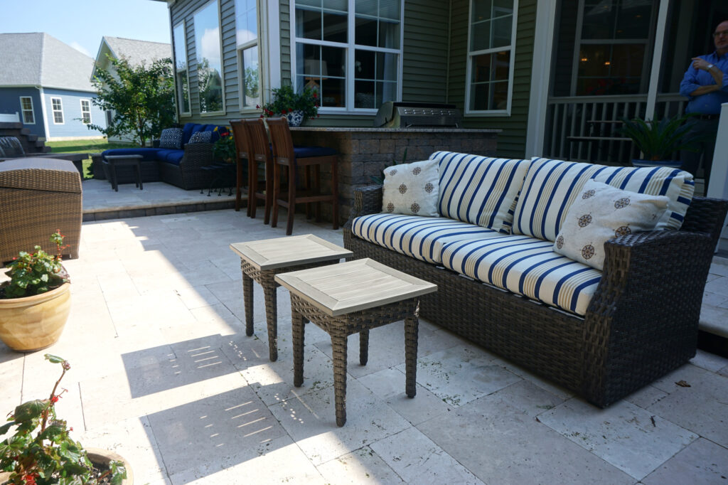Thumbnail of http://a%20couch%20and%20two%20tables%20on%20a%20patio