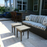 Thumbnail of http://a%20couch%20and%20two%20tables%20on%20a%20patio