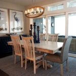 Thumbnail of http://a%20dinning%20room%20table%20with%20chairs%20and%20pictures%20on%20the%20wall