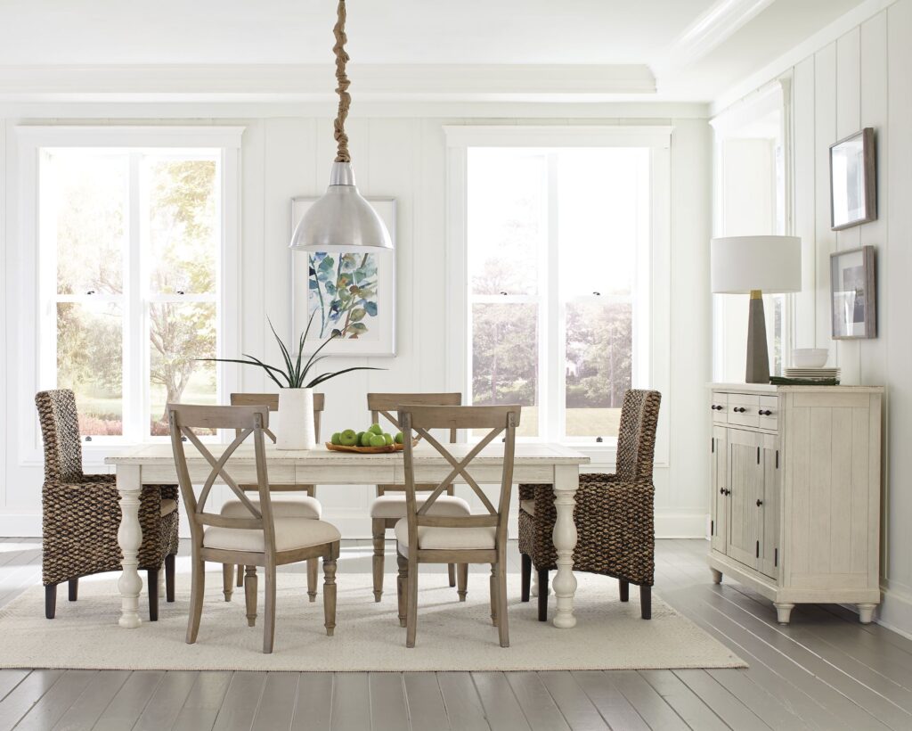 Thumbnail of http://a%20dining%20room%20table%20with%20chairs%20and%20a%20white%20rug