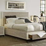 Thumbnail of http://a%20bedroom%20with%20a%20bed,%20nightstands%20and%20pictures%20on%20the%20wall