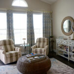 Thumbnail of http://a%20living%20room%20with%20two%20chairs%20and%20a%20coffee%20table