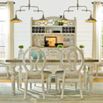 Thumbnail of http://a%20dining%20room%20table%20and%20chairs%20with%20white%20walls