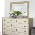 Thumbnail of http://a%20dresser%20with%20a%20mirror%20and%20vases%20on%20top