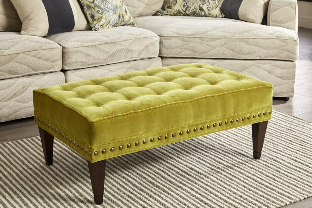 Thumbnail of http://a%20yellow%20bench%20sitting%20on%20top%20of%20a%20rug