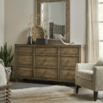 Thumbnail of http://a%20living%20room%20with%20a%20chair%20and%20a%20large%20mirror