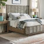 Thumbnail of http://a%20bedroom%20with%20a%20bed,%20nightstands%20and%20a%20plant