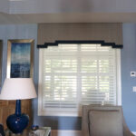 Thumbnail of http://a%20living%20room%20with%20blue%20walls%20and%20white%20blinds