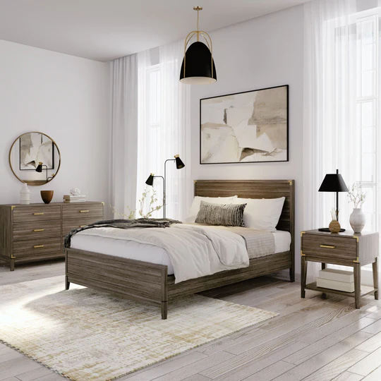 a bedroom with white walls and wooden furniture