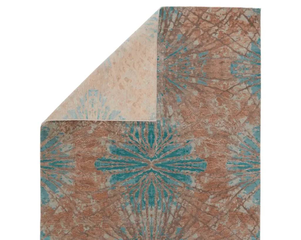 Thumbnail of http://a%20brown%20and%20blue%20rug%20with%20an%20intricate%20design