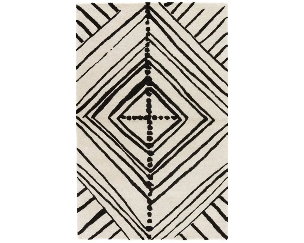 Thumbnail of http://a%20black%20and%20white%20rug%20with%20an%20abstract%20design