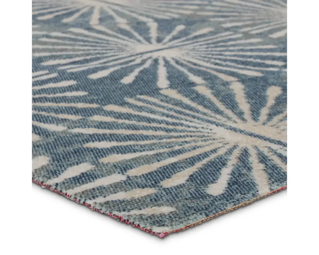 Thumbnail of http://a%20blue%20and%20white%20rug%20with%20an%20intricate%20design