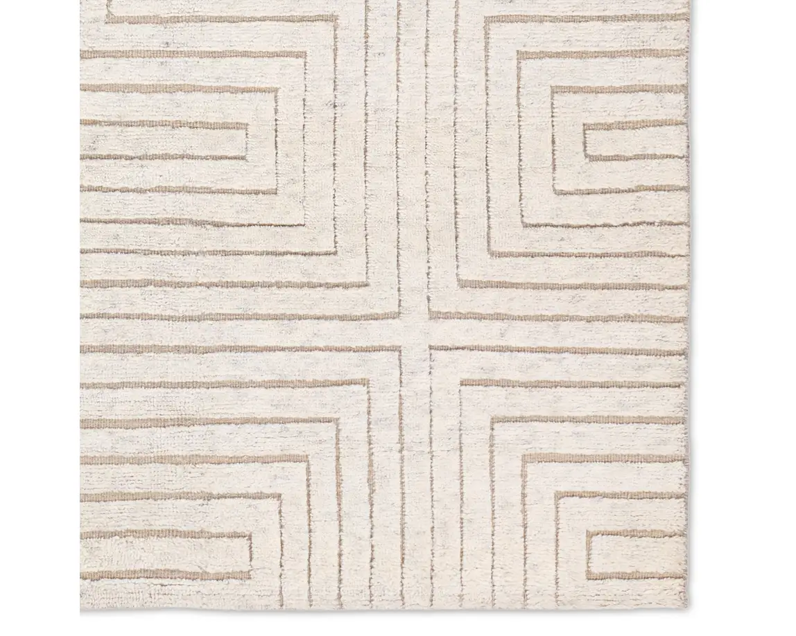 a white rug with lines on it