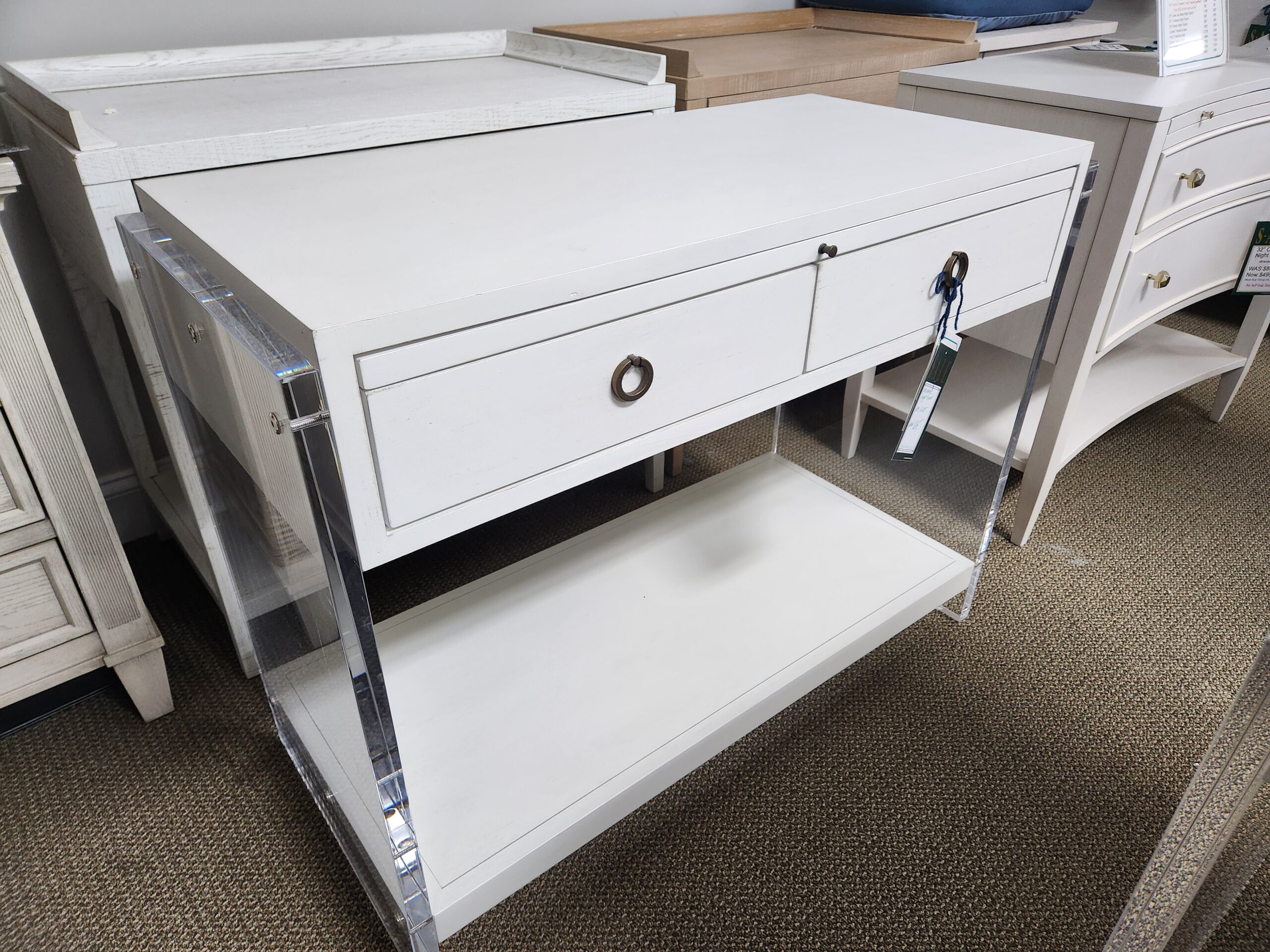 a white desk with drawers and a drawer