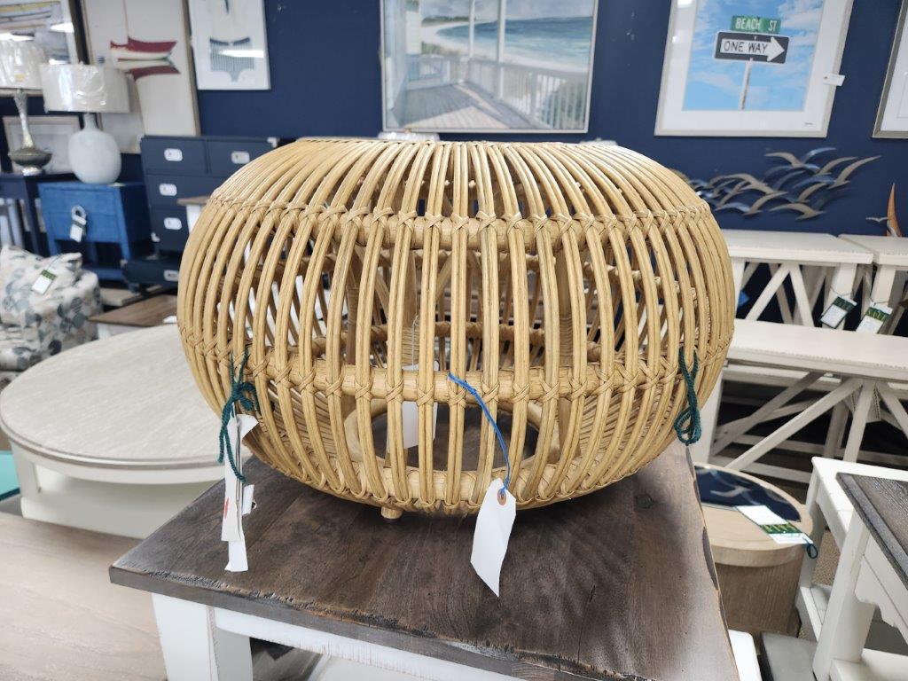 a large wicker ball sitting on top of a table