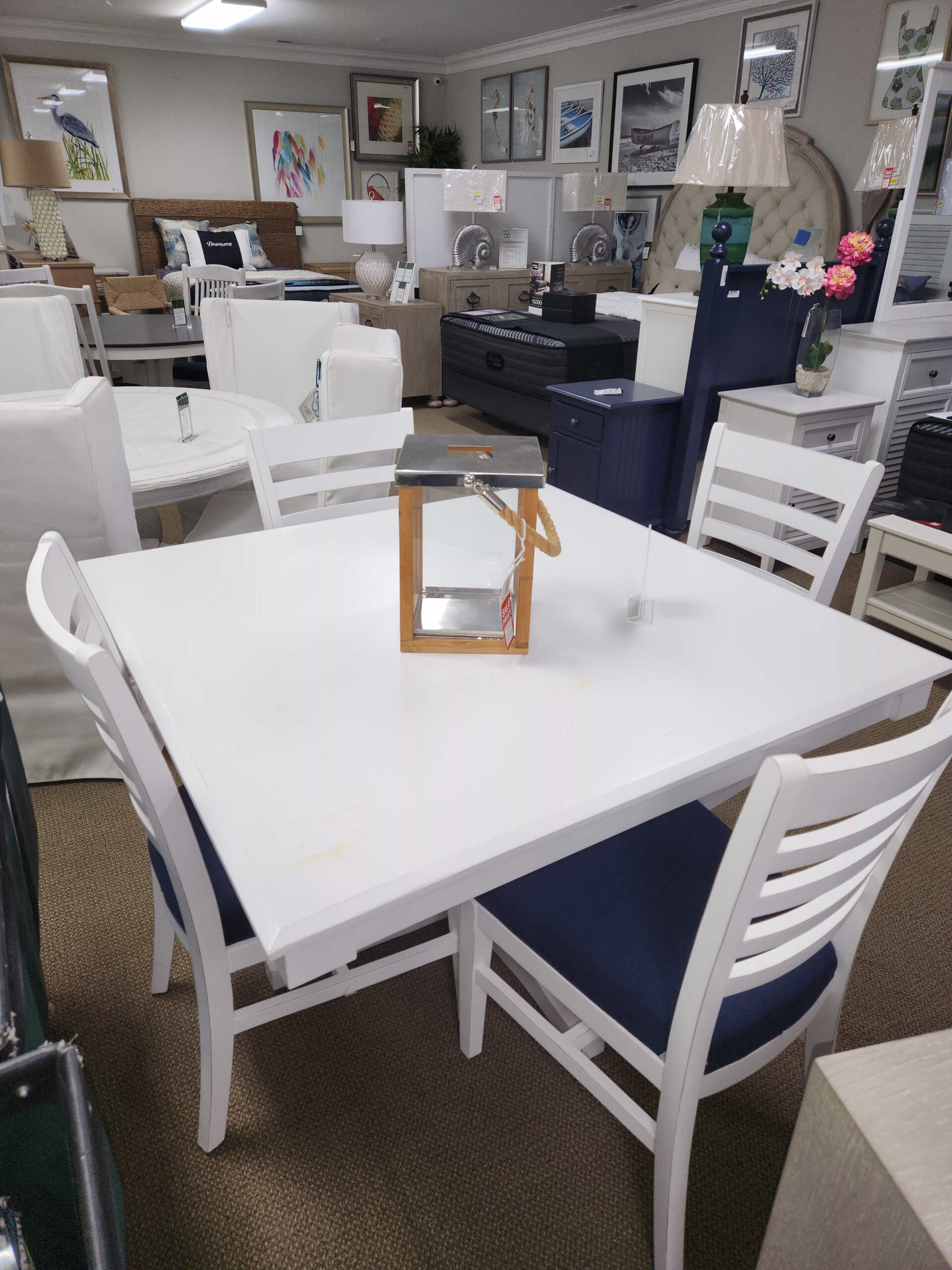 a white table and chairs in a room