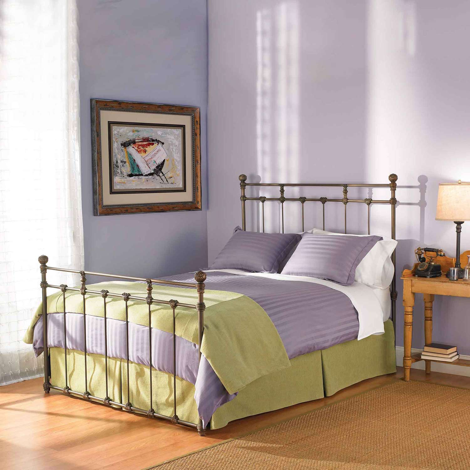 a bedroom with purple walls and a metal bed frame