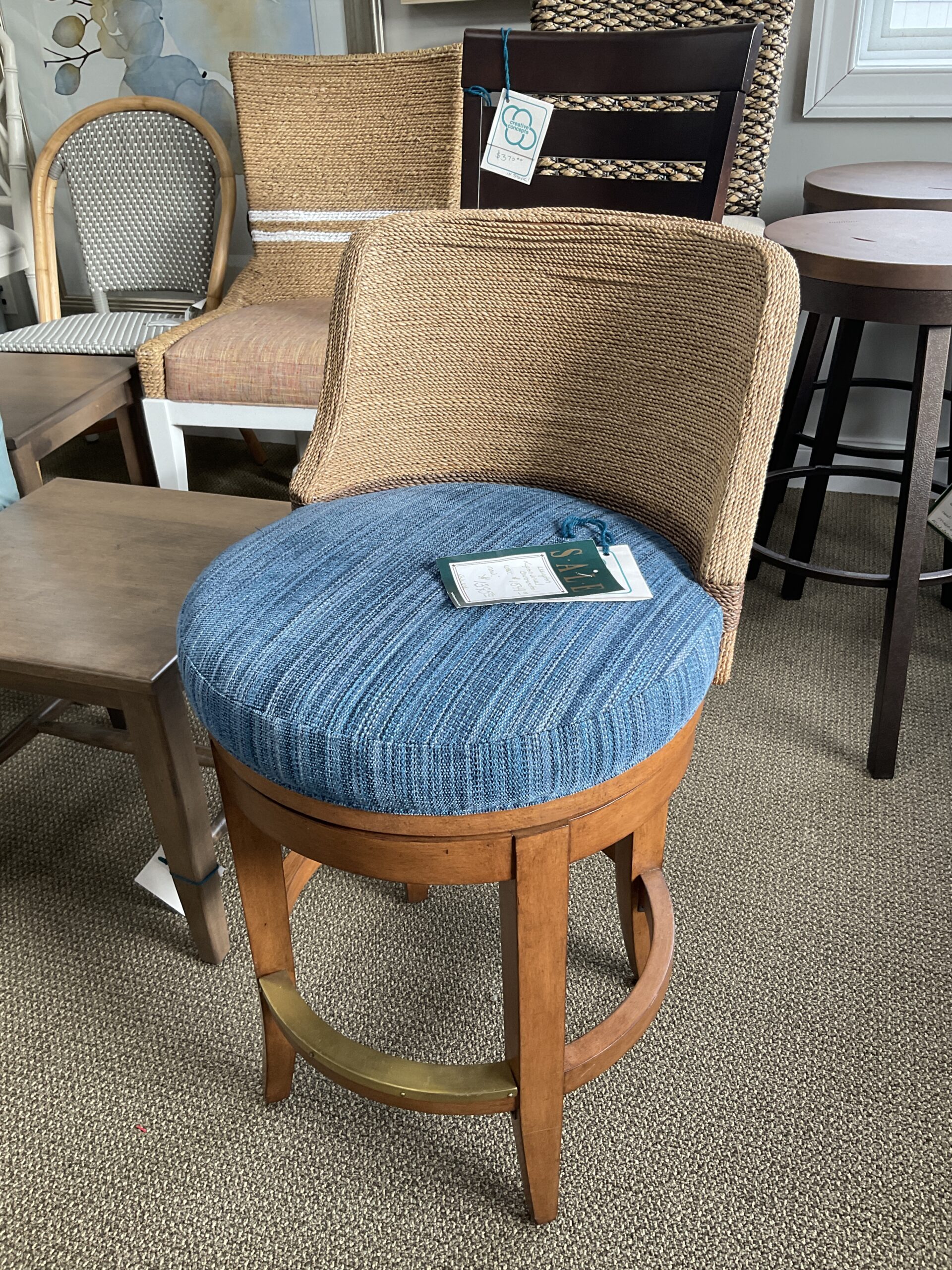 a chair with a blue cushion on top of it